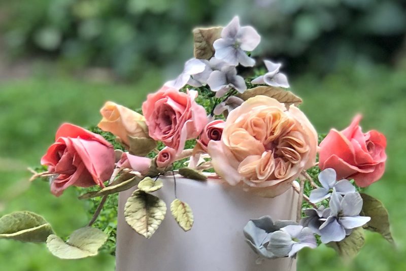 4 Reasons to Consider Sugar Flowers on Your Wedding Cake. For more wedding cake tips, visit burghbrides.com!