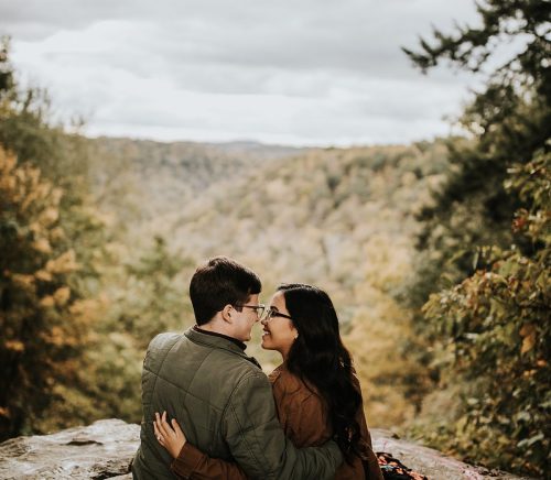 Earthy Engagement Session at McConnells Mill. For more fall engagement photo ideas, visit burghbrides.com!