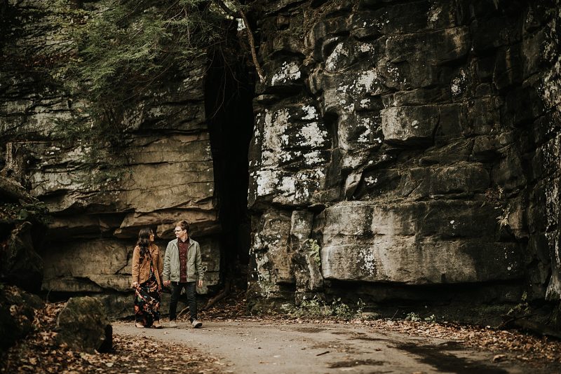 Earthy Engagement Session at McConnells Mill. For more fall engagement photo ideas, visit burghbrides.com!