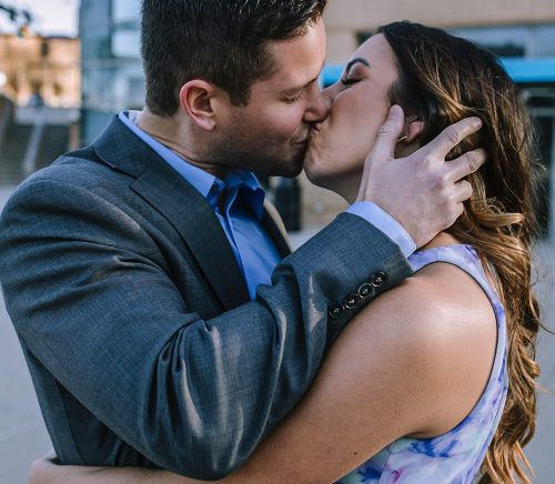Laid Back Downtown & PPG Paints Arena Engagement Session. For more Pittsburgh engagement ideas, visit burghbrides.com!