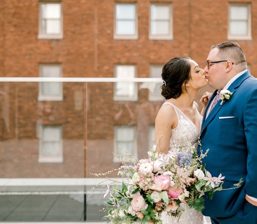 Floral Filled Energy Innovation Center Microwedding. For more small wedding ideas, visit burghbrides.com!