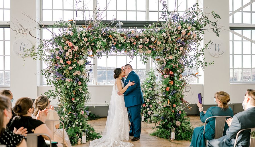 Floral Filled Energy Innovation Center Microwedding. For more small wedding ideas, visit burghbrides.com!