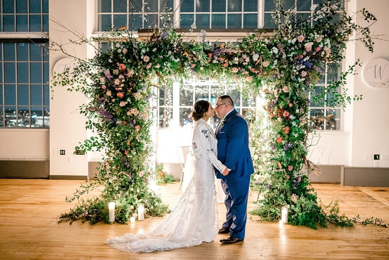 Floral Filled Energy Innovation Center Microwedding. For more small wedding ideas, visit burghbrides.com!